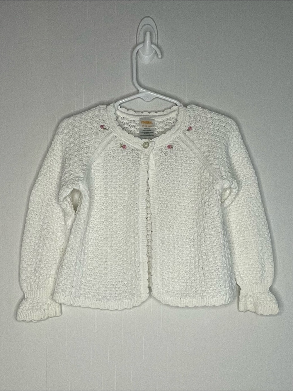 Vintage 2005 Gymboree White Knit Cardigan
Sweater with Pink Rosettes 18-24M